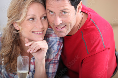 Photo: Blond woman holding champagne Blond woman holding champagne