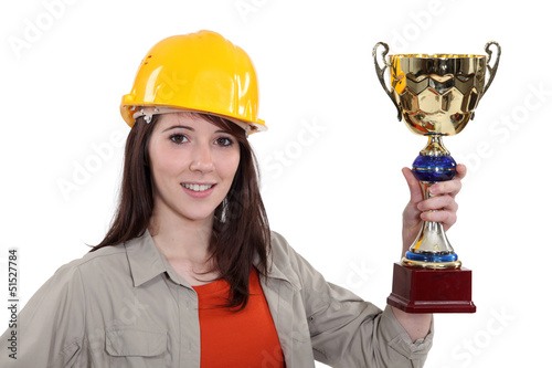 Photo: craftswoman holding trophy craftswoman holding trophy