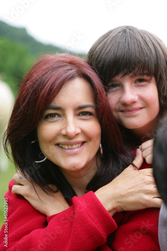Photo: mother and son embracing mother and son embracing