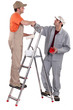Decorators shaking hands