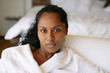 beautiful Afro-American woman relaxing on the couch