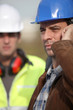 Construction worker on the phone