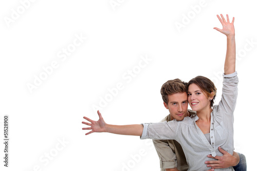 Photo: girl with open arms and boyfriend embracing her girl with open arms and boyfriend embracing her