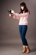 young woman with video camera