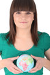 brown-haired girl holding globe