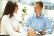 Foto: Smiling to colleague Smiling to colleague