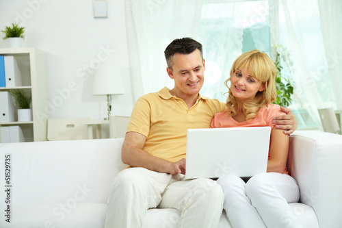 Photo: Couple with laptop Couple with laptop