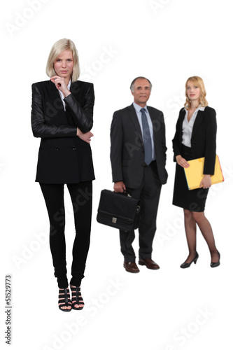 Photo: Three business people Three business people