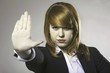 Young woman making stop gesture sign