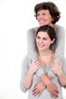 mother and daughter embracing
