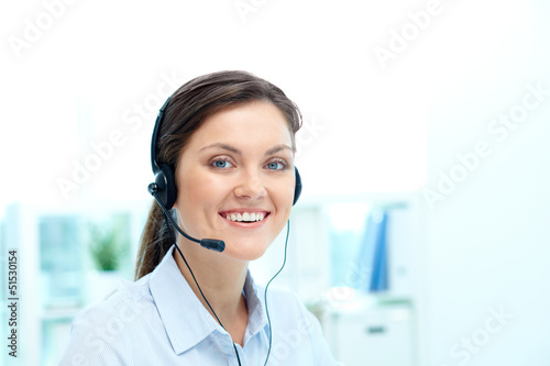 Photo: Woman with headset Woman with headset