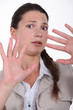 closeup shot of woman expressing refusal with hands