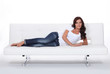 woman lying on a couch