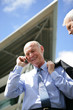 Smiling businessman on the phone