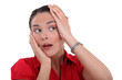 Woman touching her head