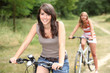 Photo: Two girls on bikes Two girls on bikes