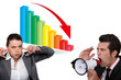 Photo: Business people with a downward graph and loudspeaker Business people with a downward graph and loudspeaker