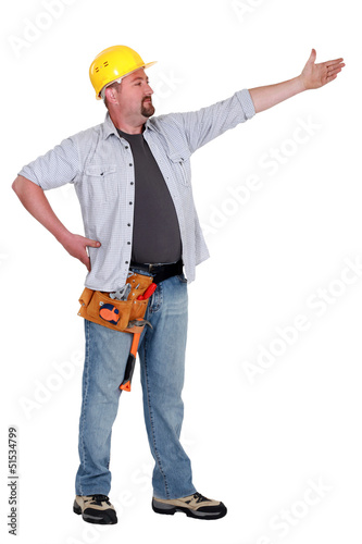 Photo: Builder directing Builder directing