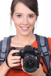 Photo: Woman with a digital camera Woman with a digital camera