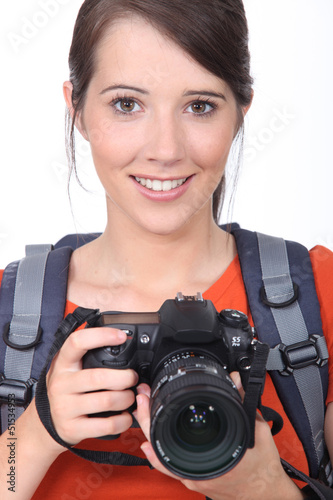 Photo: Woman with a digital camera Woman with a digital camera