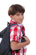 Foto: portrait of schoolboy with satchel portrait of schoolboy with satchel