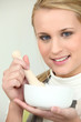 Photo: Blonde woman with mortar Blonde woman with mortar
