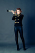 Photo: Beautiful girl in the old-fashioned uniform holds a spyglass. Beautiful girl in the old-fashioned uniform holds a spyglass.