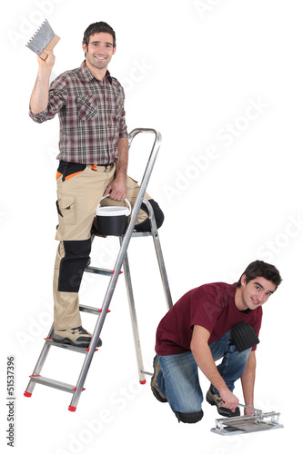 Photo: Two decorators working on site Two decorators working on site