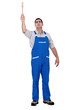 Man with paint brush raising arm