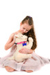 The girl with a toy puppy