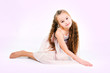 The imade of girl in a pink dress