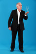 Businessman blowing on  glass