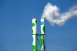 Two chimneys with smoke