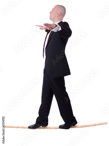 Photo: businessman tightrope businessman tightrope
