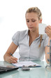 Secretary filling in paperwork