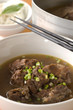 Photo: Chinese Beef Soup w Rice Noodles in background Chinese Beef Soup w Rice Noodles in background