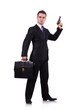 Businessman with gun isolated on white