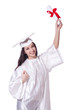 Photo: Young female student with diploma on white Young female student with diploma on white