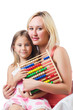 Mother and daughter with abacus on white