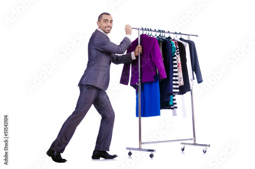 Photo: Businessman with rack of clothing Businessman with rack of clothing