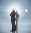 Photo: Business people with light bulbs heads and partnership text Business people with light bulbs heads and partnership text
