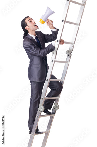 Photo: Businessman climbing the ladder isolated on white Businessman climbing the ladder isolated on white