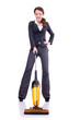 Photo: Young woman with vacuum cleaner on white Young woman with vacuum cleaner on white