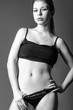 Studio fashion shot: beautiful girl wearing panties and shirt