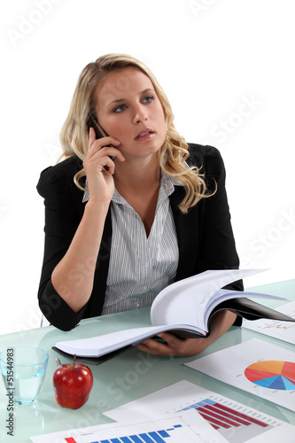 Photo: Employee on the phone Employee on the phone