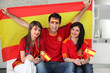 Thee excited Spanish soccer fans