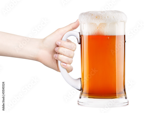 Photo: beer with woman hand making toast beer with woman hand making toast