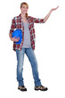 craftswoman pointing at something