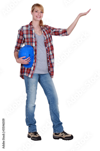 Photo: craftswoman pointing at something craftswoman pointing at something