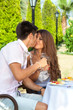 Young Beautiful Couple Kissing...